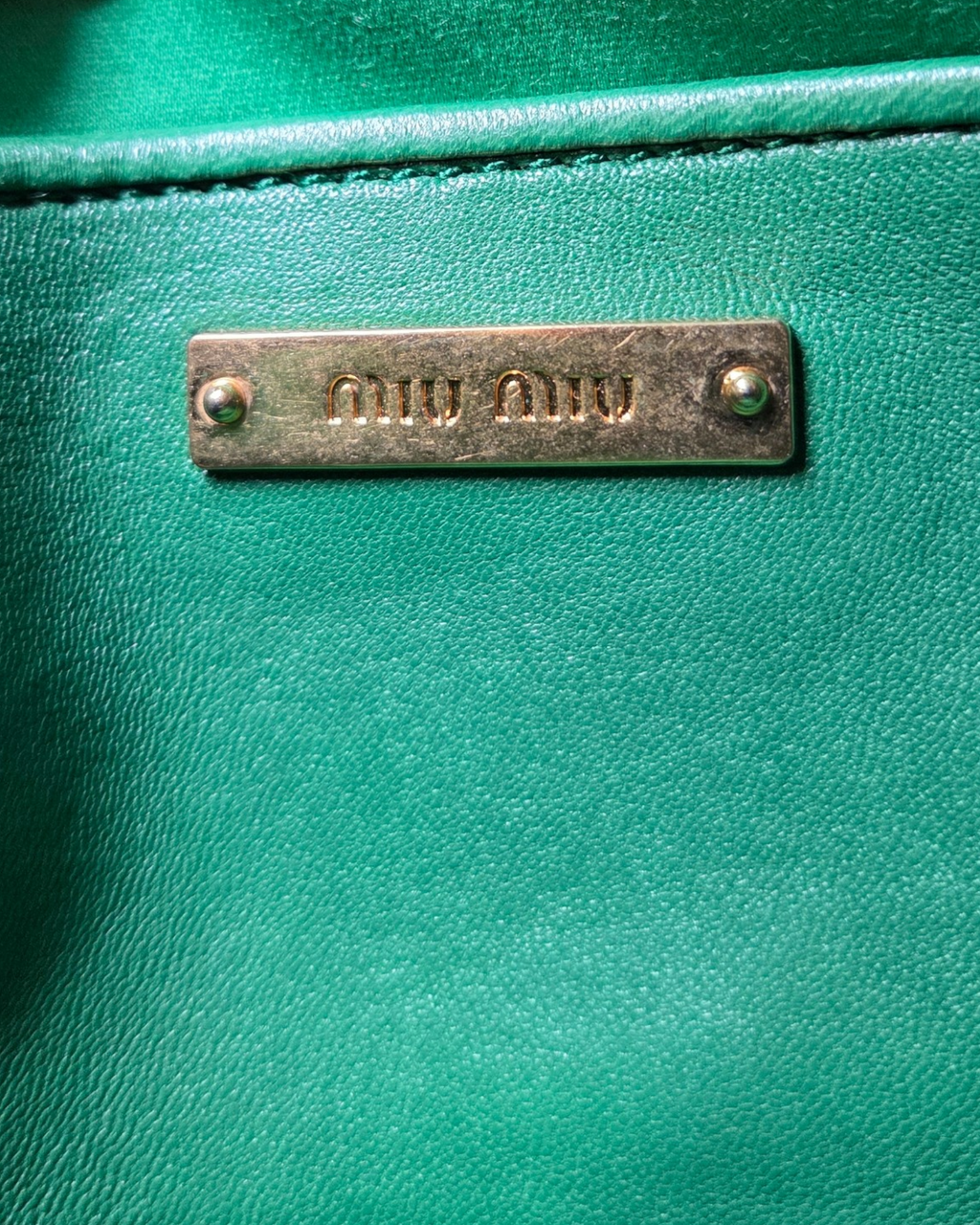 Miu Miu Matelasse Crossbody Tasche